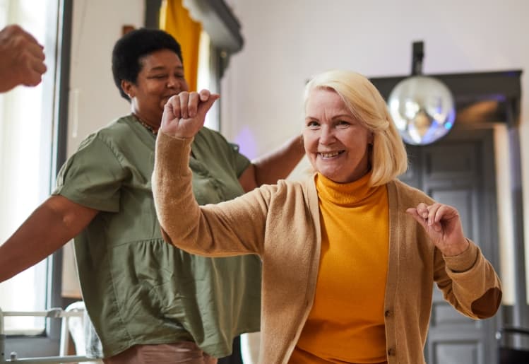 Senior living residents dancing