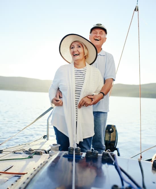 Happy seniors on a boat.