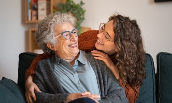 Happy senior woman and her daughter.