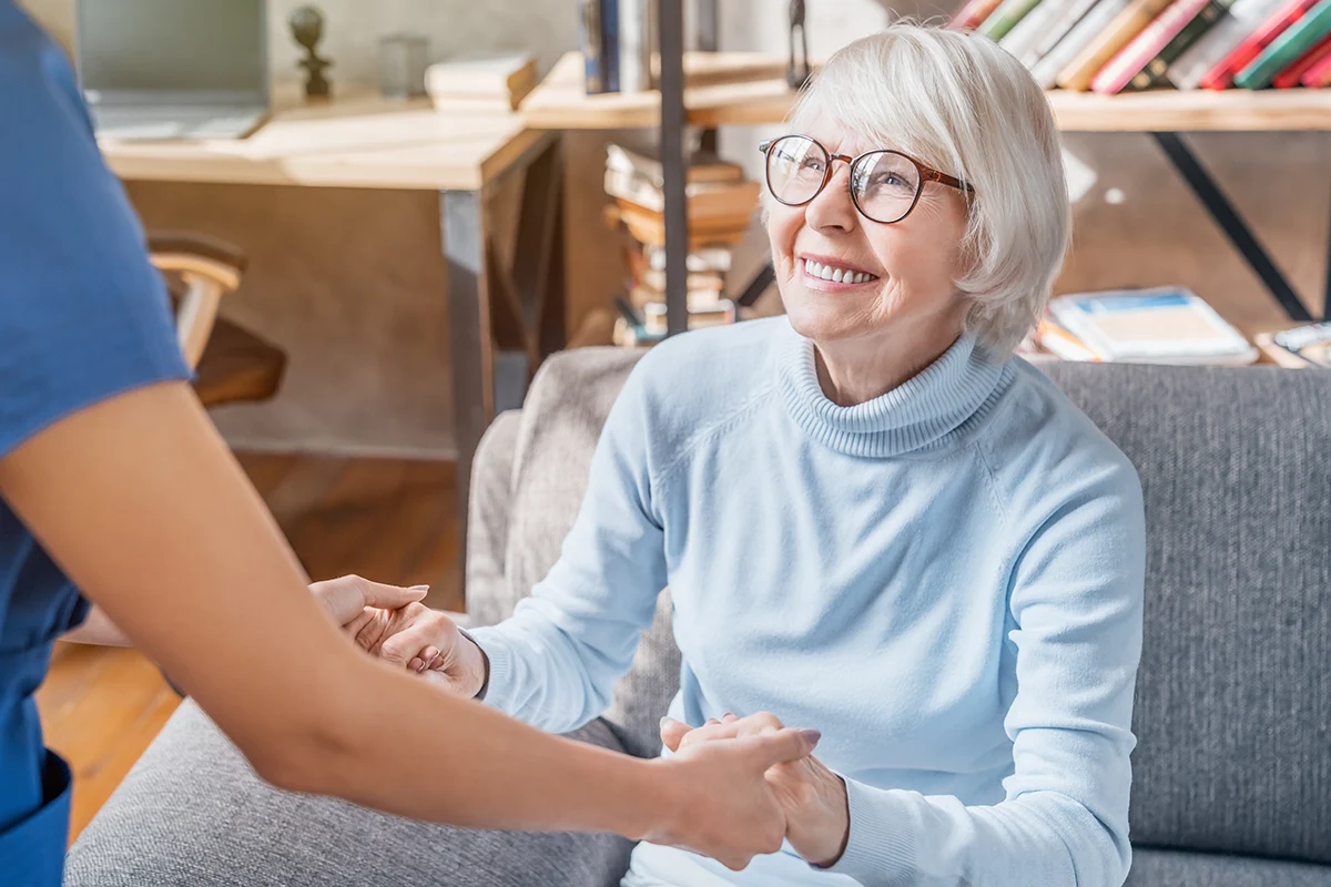 Happy senior woman with glasses