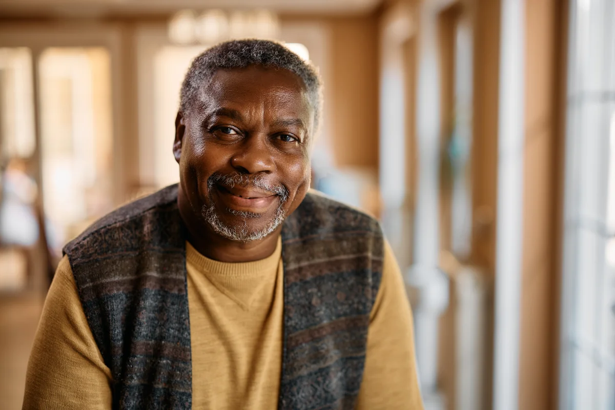 Happy smiling senior man at senior living community