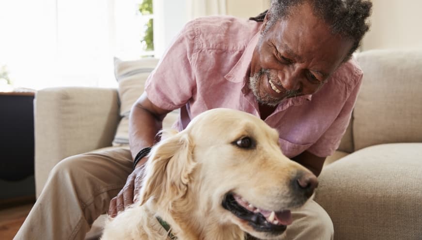 Happy senior man with his dog