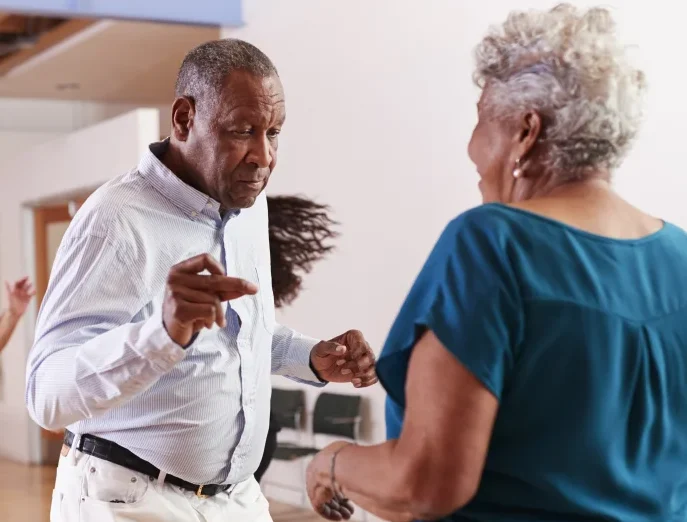 seniors attending dance class at community center